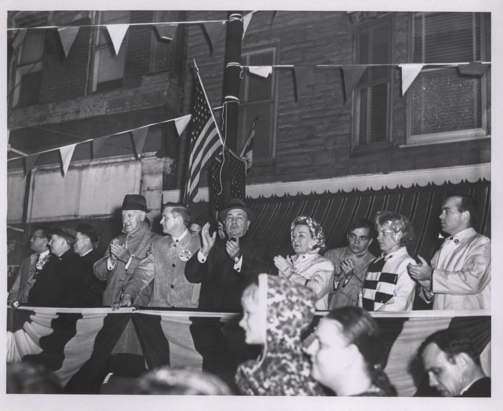 Election night parade, Richard J. Daley and others on reviewing stand