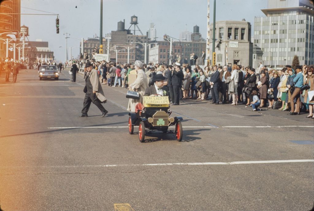 St. Patrick's Day Parade in Chicago, 1966, man in tiny car