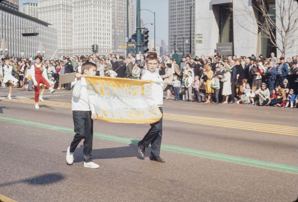Miniature of St. Patrick's Day Parade in Chicago, 1966, boys with St. Daniel's Majorettes banner