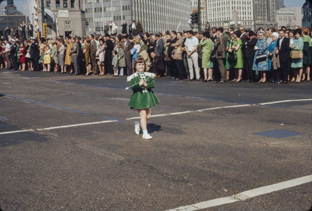 St. Patrick's Day Parade in Chicago, 1966, young majorette marching