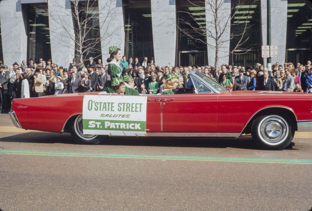 St. Patrick's Day Parade in Chicago, 1966, women riding in an open car