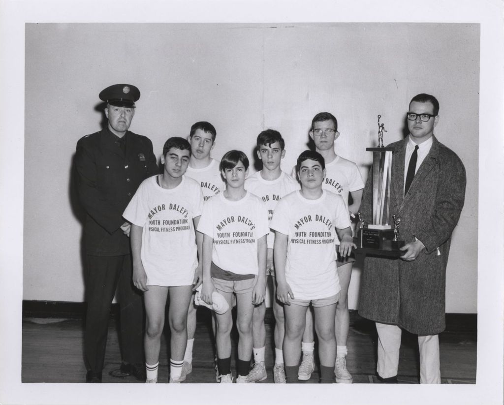 Miniature of Mayor Daley's Physical Fitness Award event, Youth Foundation program participants with trophy