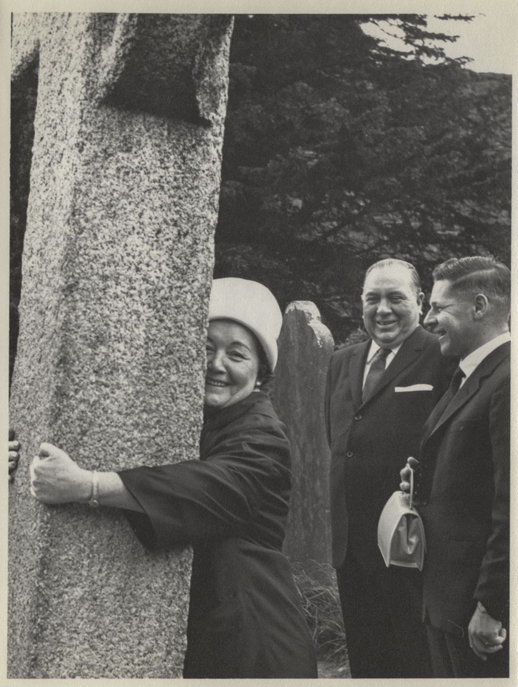 Trip to Ireland, Eleanor Daley hugging a stone cross