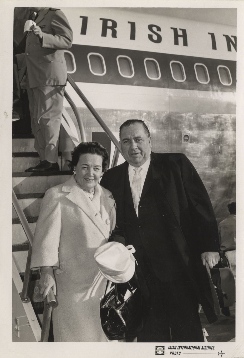 Miniature of Richard J. and Eleanor Daley on the steps of an airplane before their first trip to Ireland
