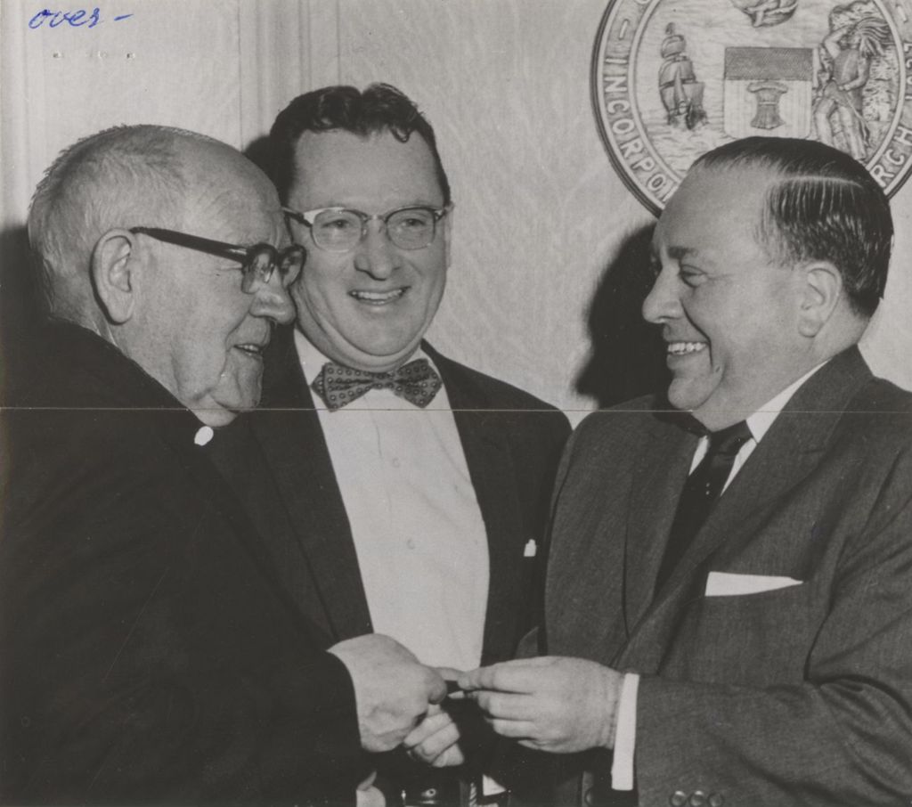 Father John Blowick, James L. Nolan, and Richard J. Daley
