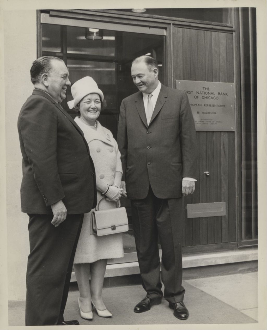 Miniature of Eleanor and Richard J. Daley with a representative of the First National Bank of Chicago in London