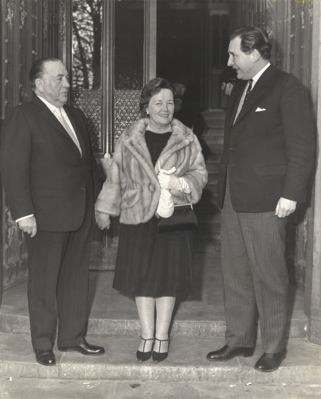 Miniature of Richard J. and Eleanor Daley with a member of Parliament at the House of Commons in London