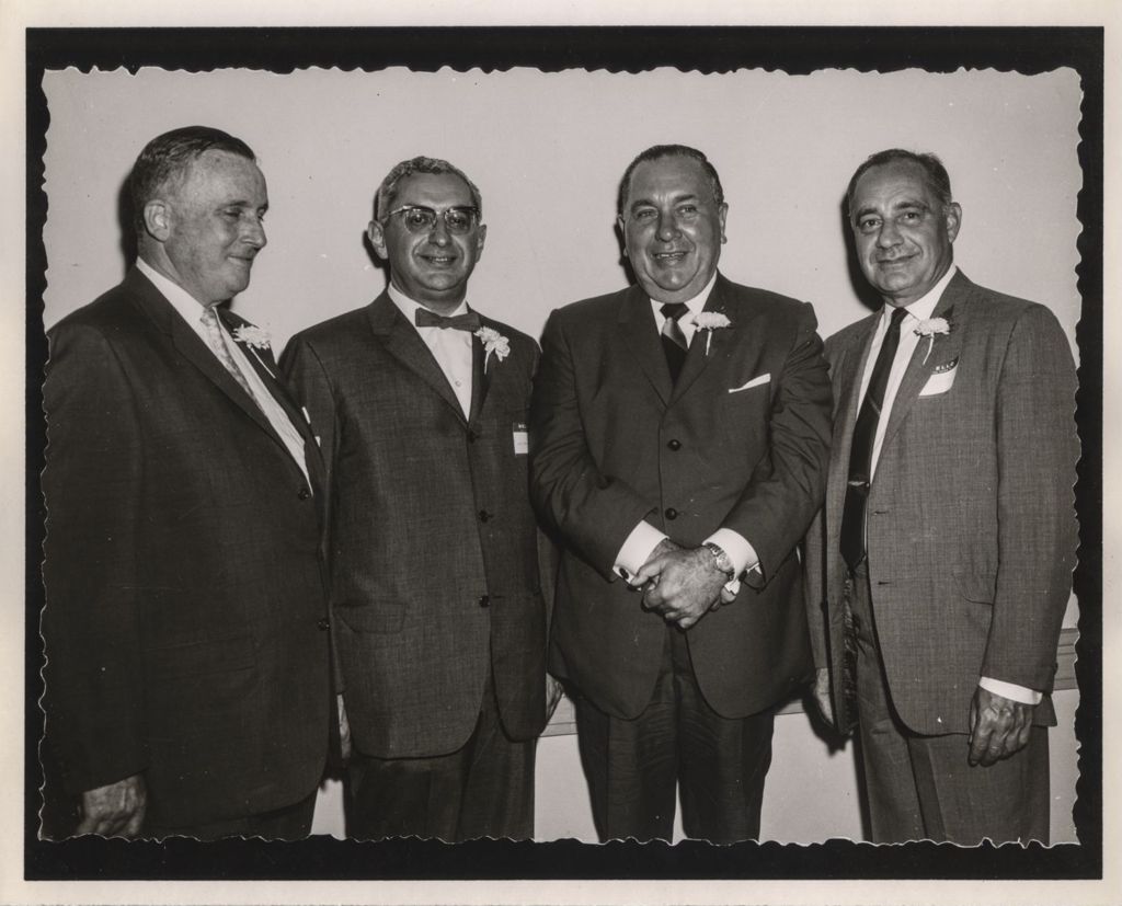 Friendship Banquet photo album, Richard J. Daley with three men