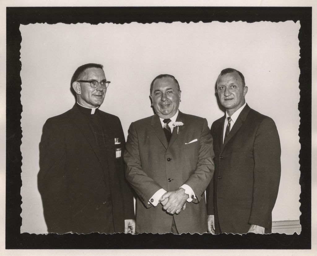 Miniature of Friendship Banquet photo album, Richard J. Daley with a priest and a man