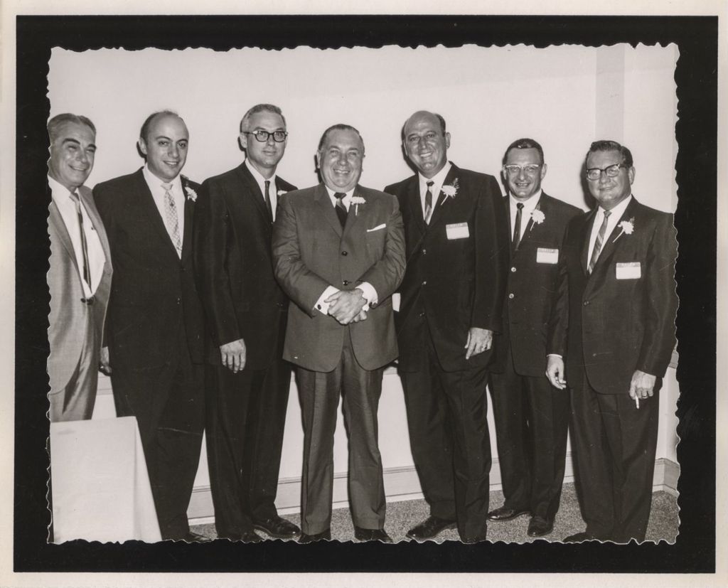 Friendship Banquet photo album, Richard J. Daley in a group of men