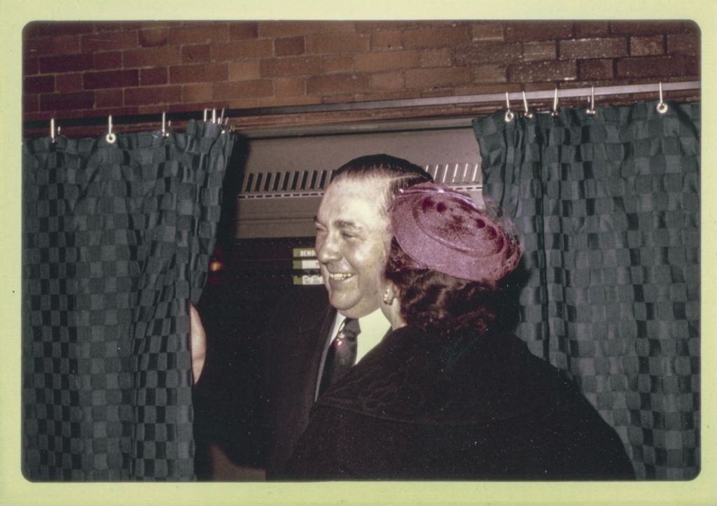 Primary election day, Richard J. and Eleanor Daley at a voting booth