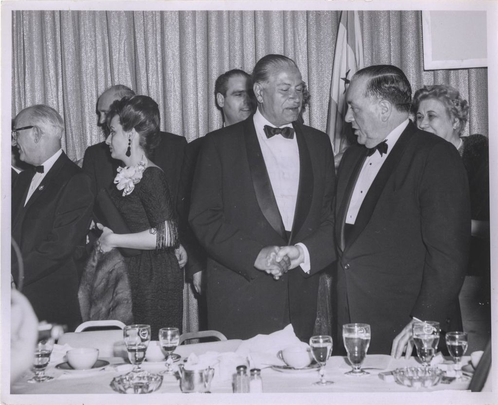Miniature of Richard J. Daley with a man at a banquet