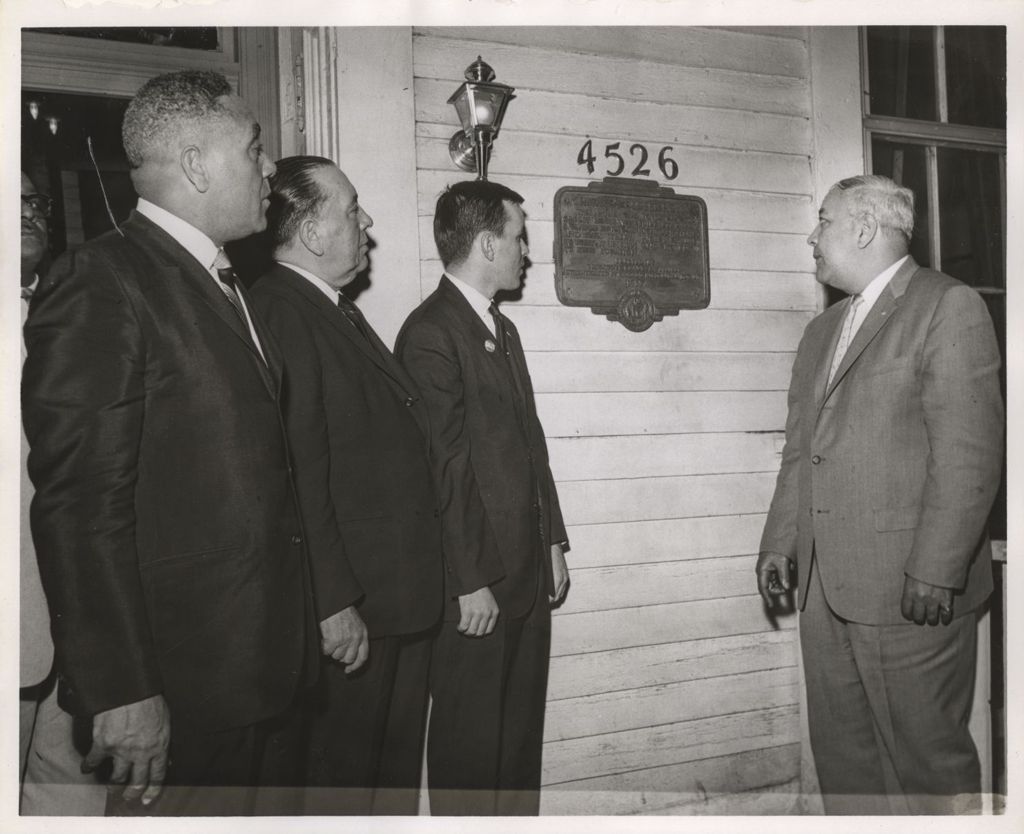 Richard J. Daley and others on porch of Clarke House
