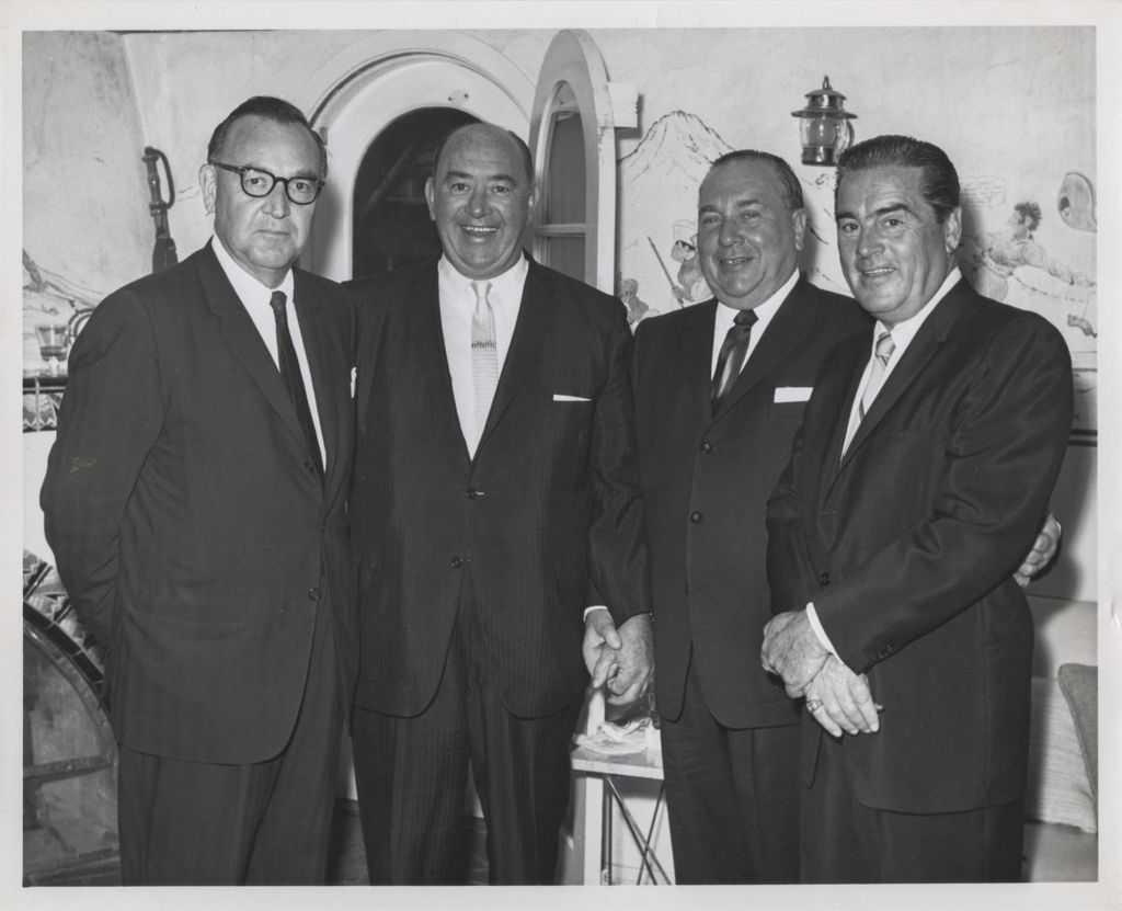 Richard J. Daley with three men