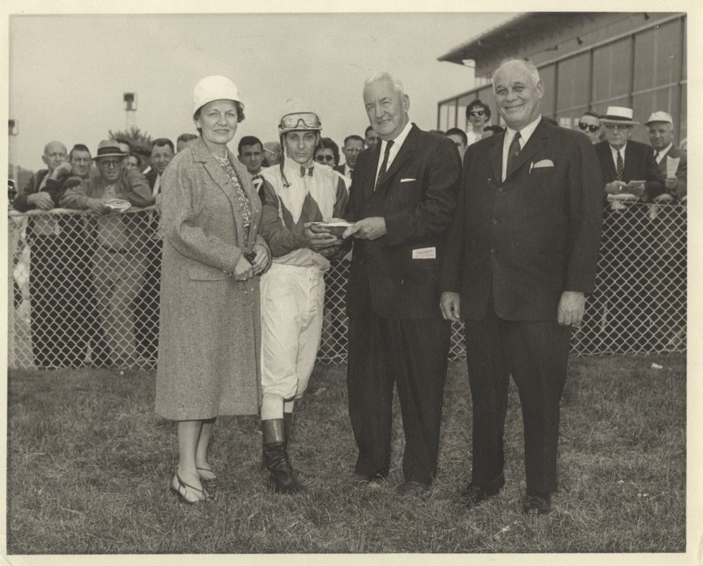 Miniature of William J. Hartigan and jockey with Mr. and Mrs. B.E. Bensinger at Washington Park