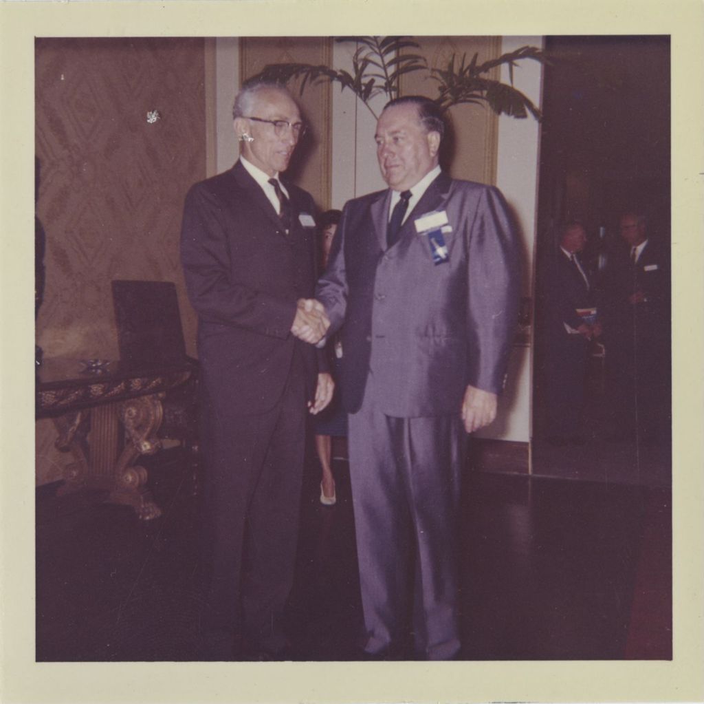 Miniature of Richard J. Daley shaking hands with Councilman Robert P. Reeves