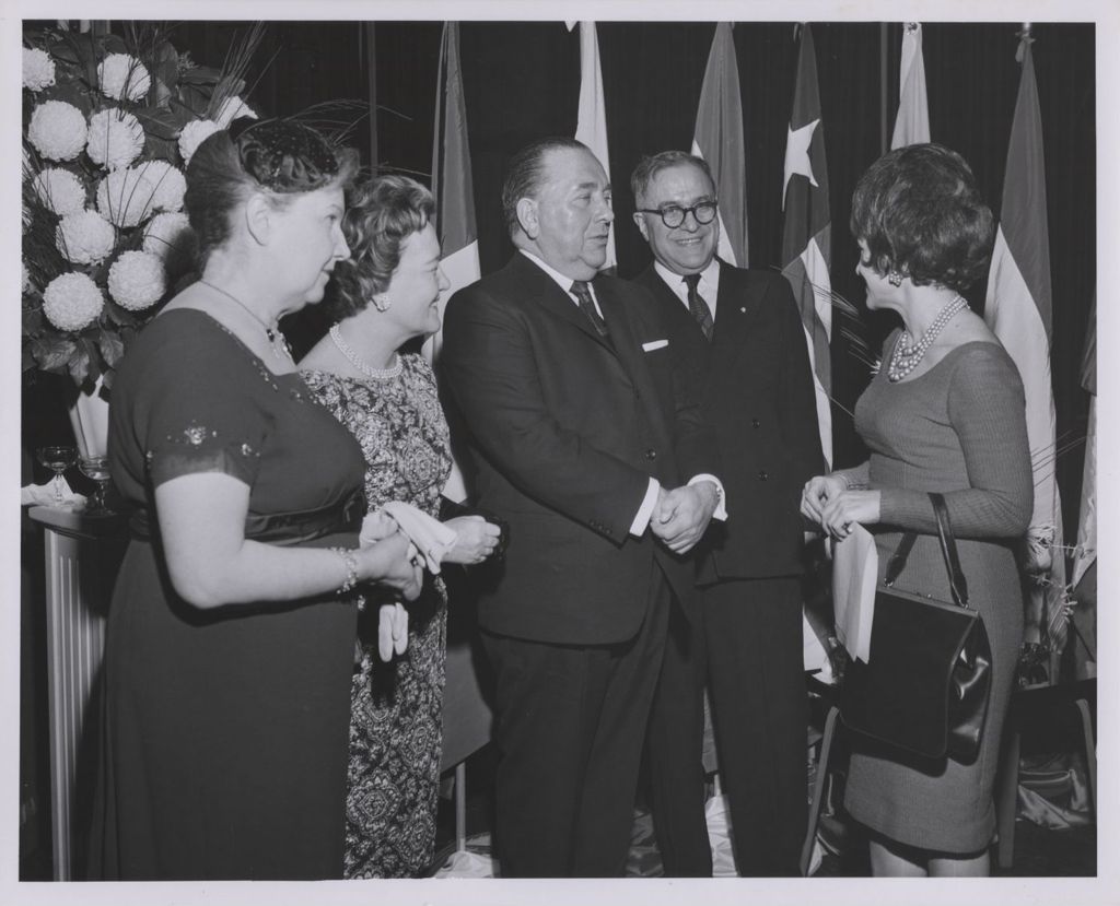 Consular Corps Reception, Richard J. Daley speaking with a woman