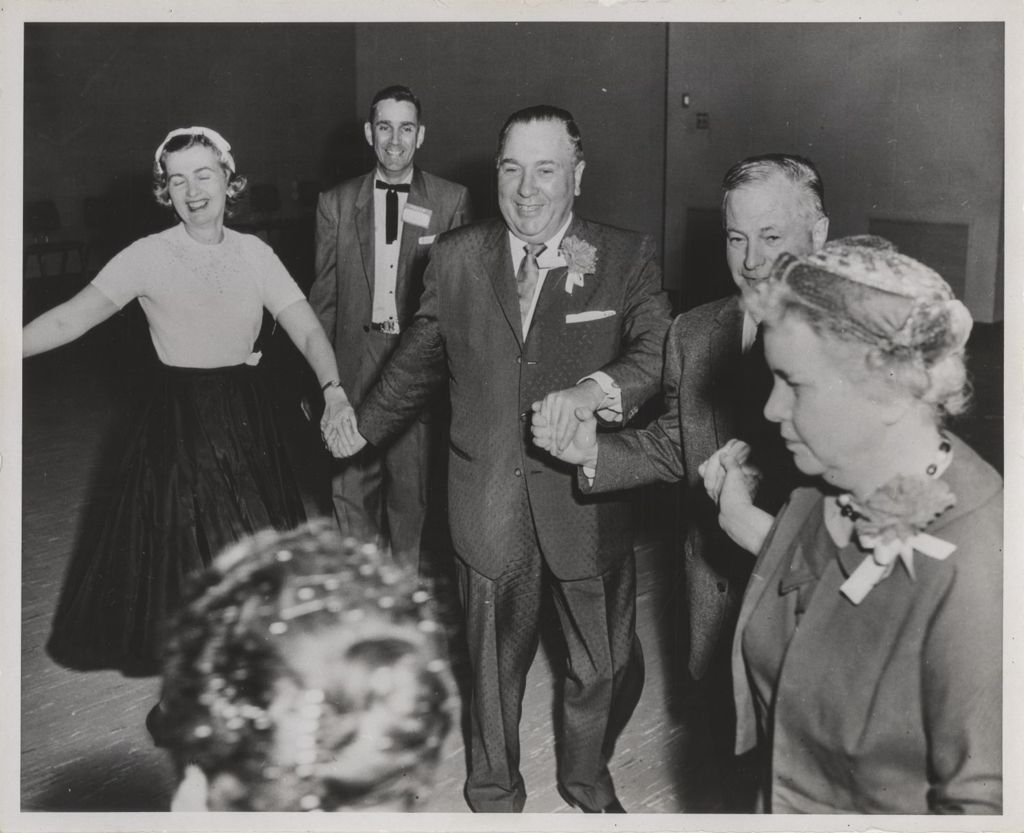Miniature of Richard J. Daley dancing in a group dance