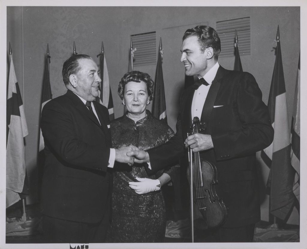 Miniature of Consular Corps Reception, Richard J. and Eleanor Daley with a violinist