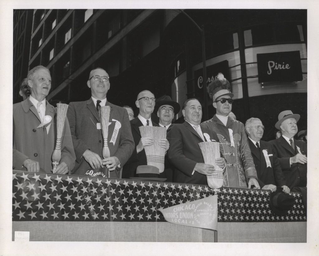 Richard J. Daley and others on a reviewing stand at a Clean Up Parade