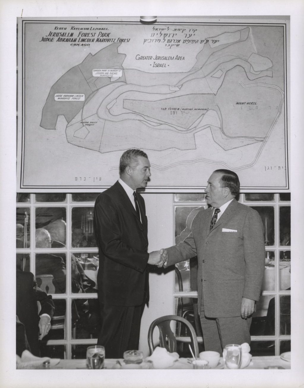 Miniature of Richard J. Daley and a man with Jerusalem map showing Judge Marovitz Forest