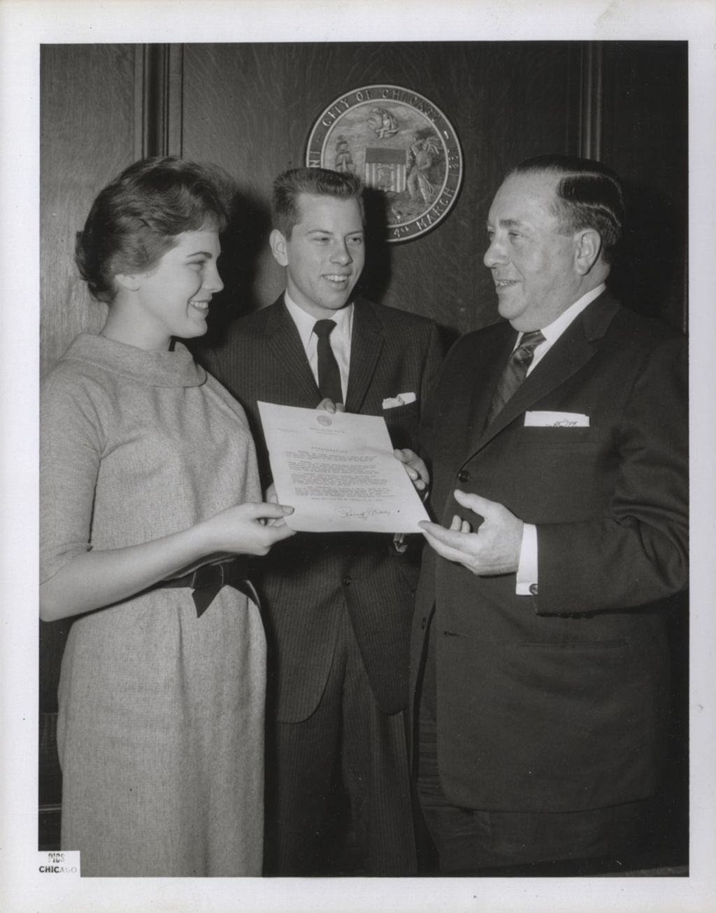 Miniature of Richard J. Daley presenting a mayoral proclamation to a couple