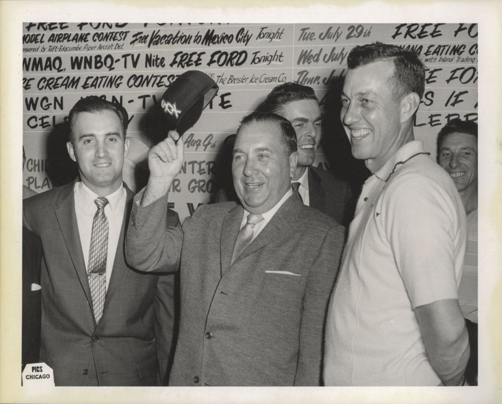 Richard J. Daley doffing a Chicago White Sox baseball cap