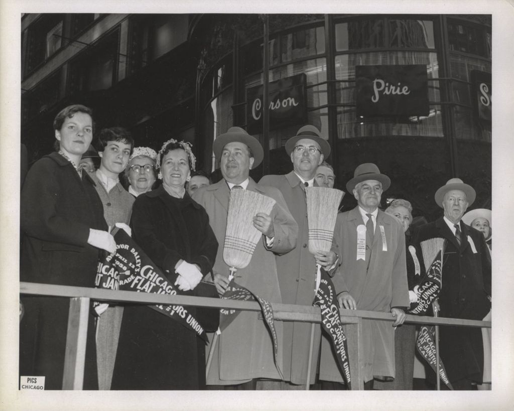 Richard J. and Eleanor Daley with two daughters and others at the Clean Up Parade