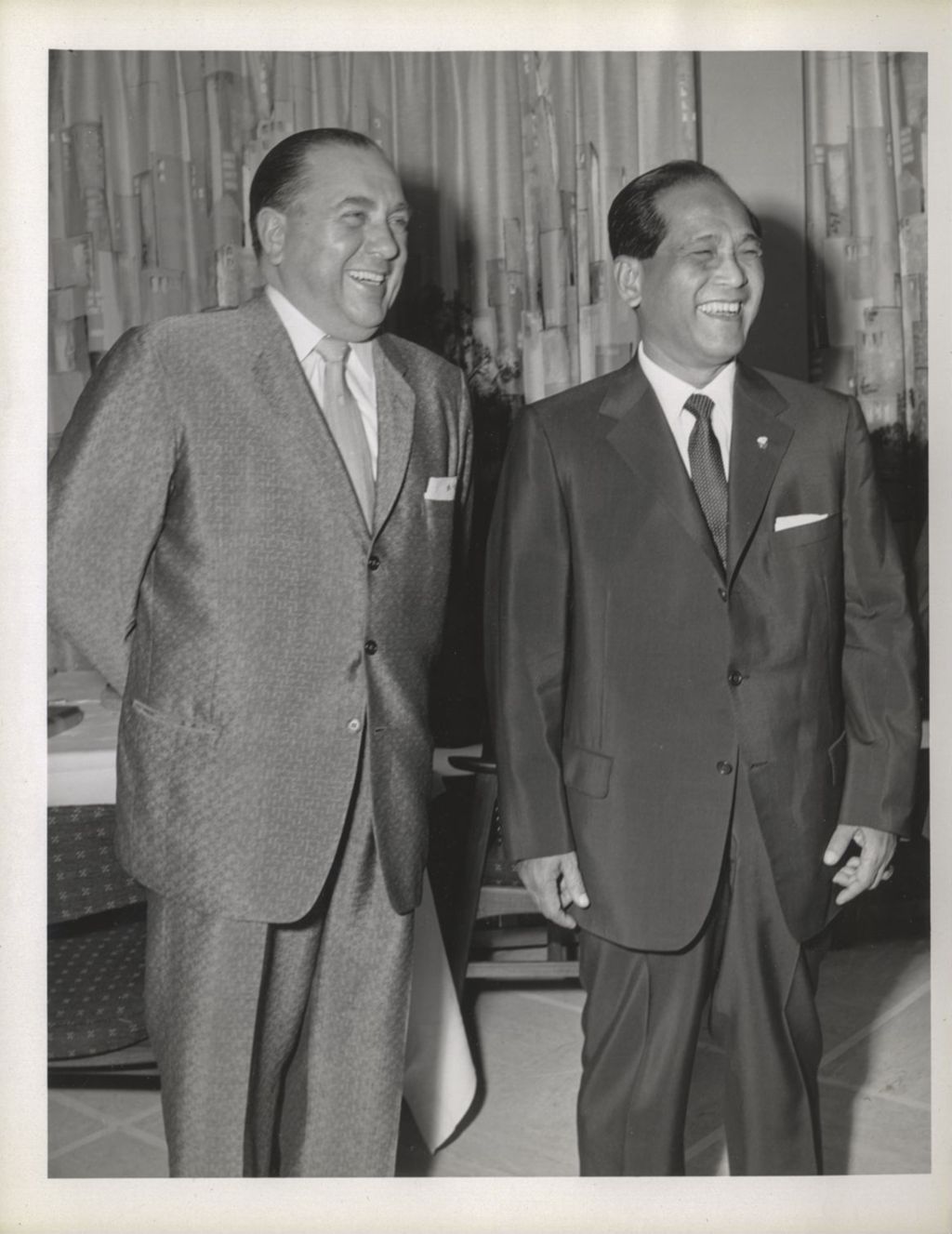Miniature of Richard J. Daley and an Asian man laughing