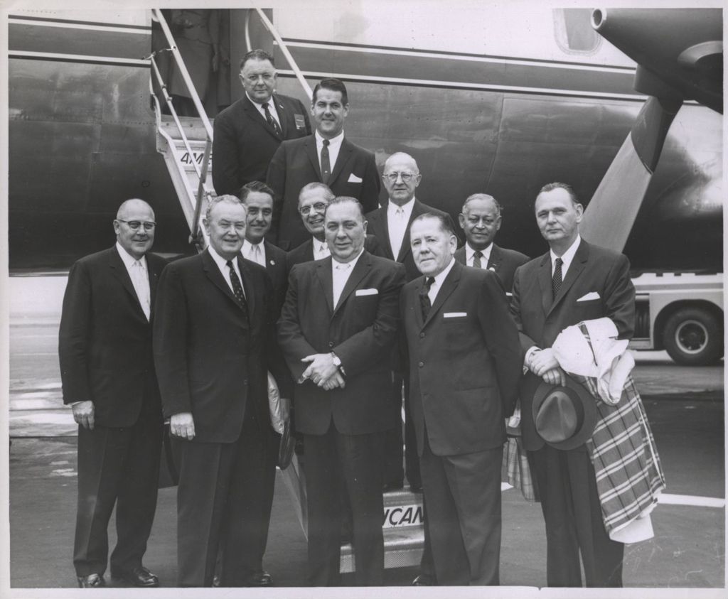 Miniature of Richard J. Daley, P. J. Cullerton, and others outside an airplane