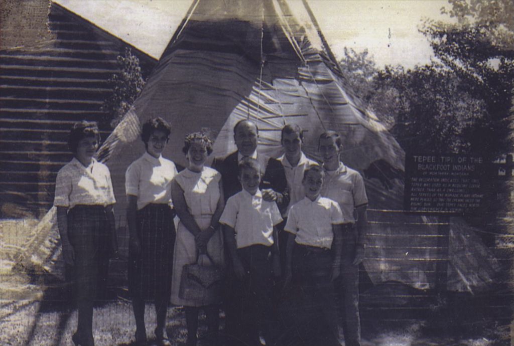 Daley family in front of a tipi during a trip