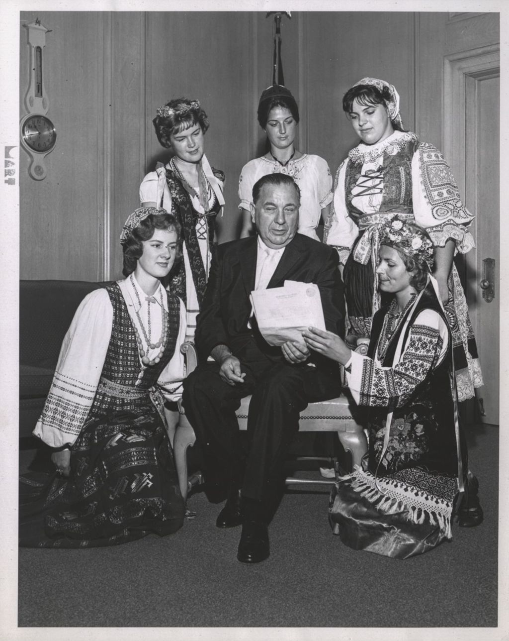Miniature of Richard J. Daley with women in national costumes for Captive Nations Week