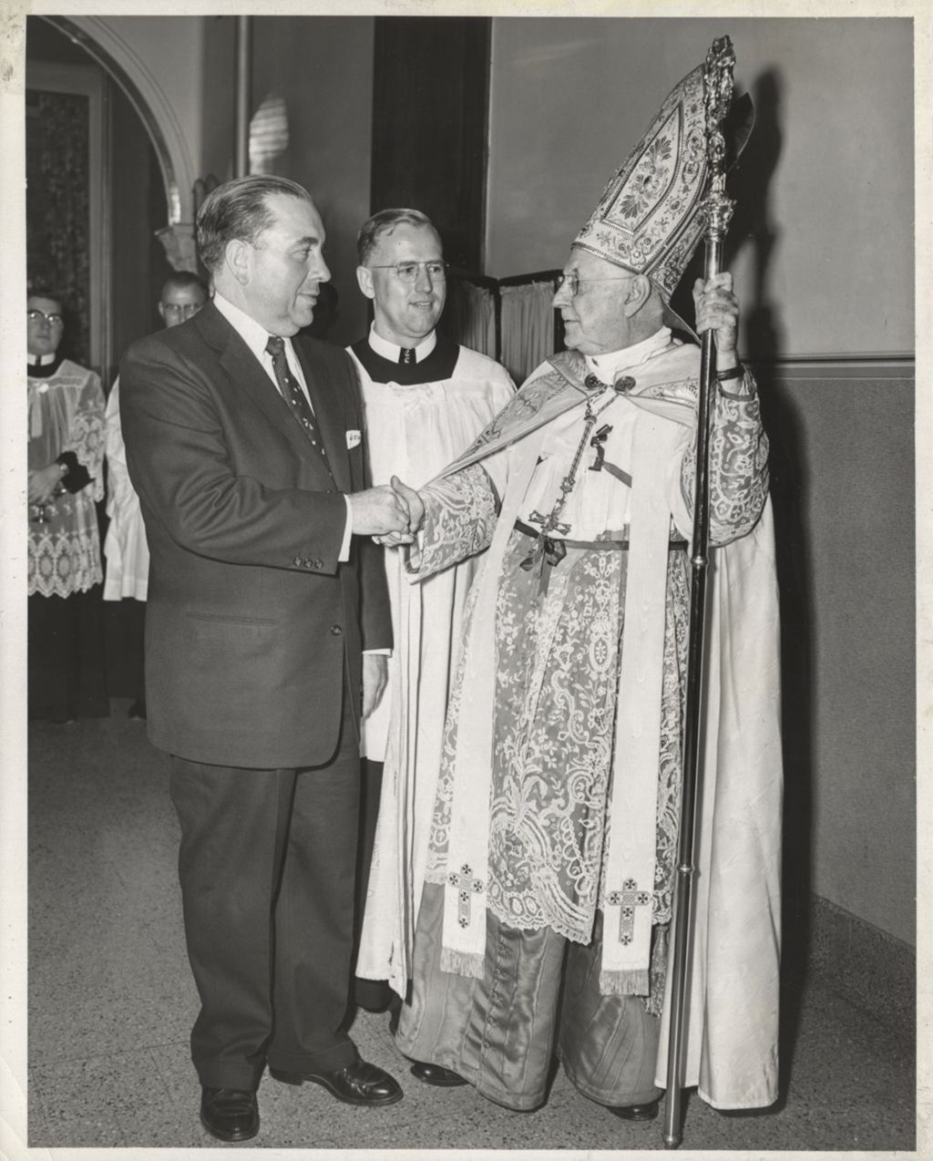 Miniature of Richard J. Daley shaking hands with Cardinal Samuel Stritch