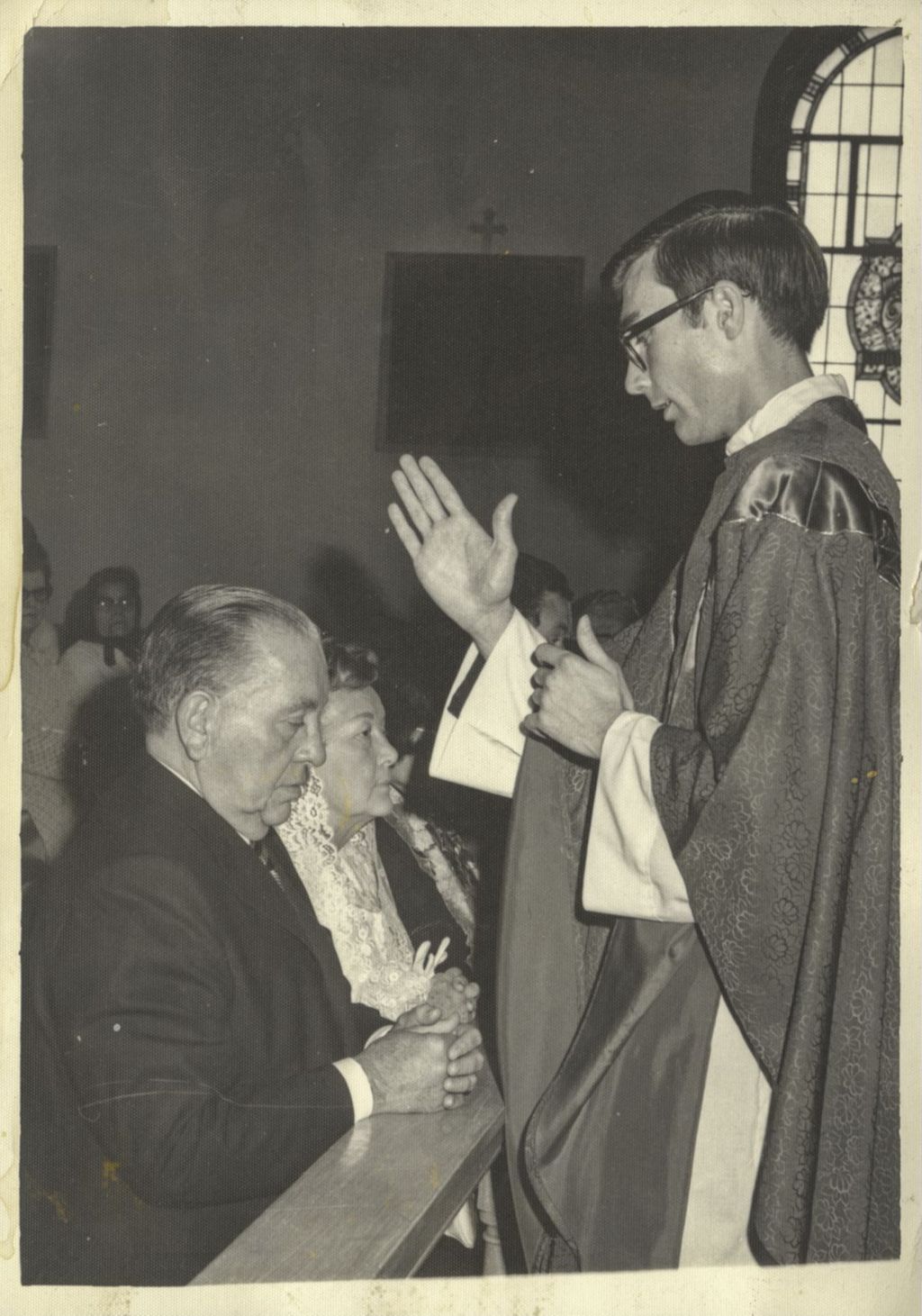 Miniature of Richard J. and Eleanor Daley receive a blessing from a priest