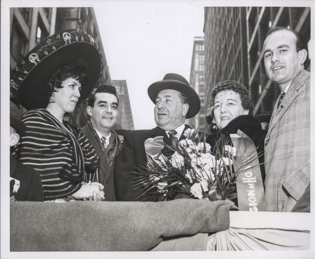 Richard J. and Eleanor Daley with others on a parade reviewing stand