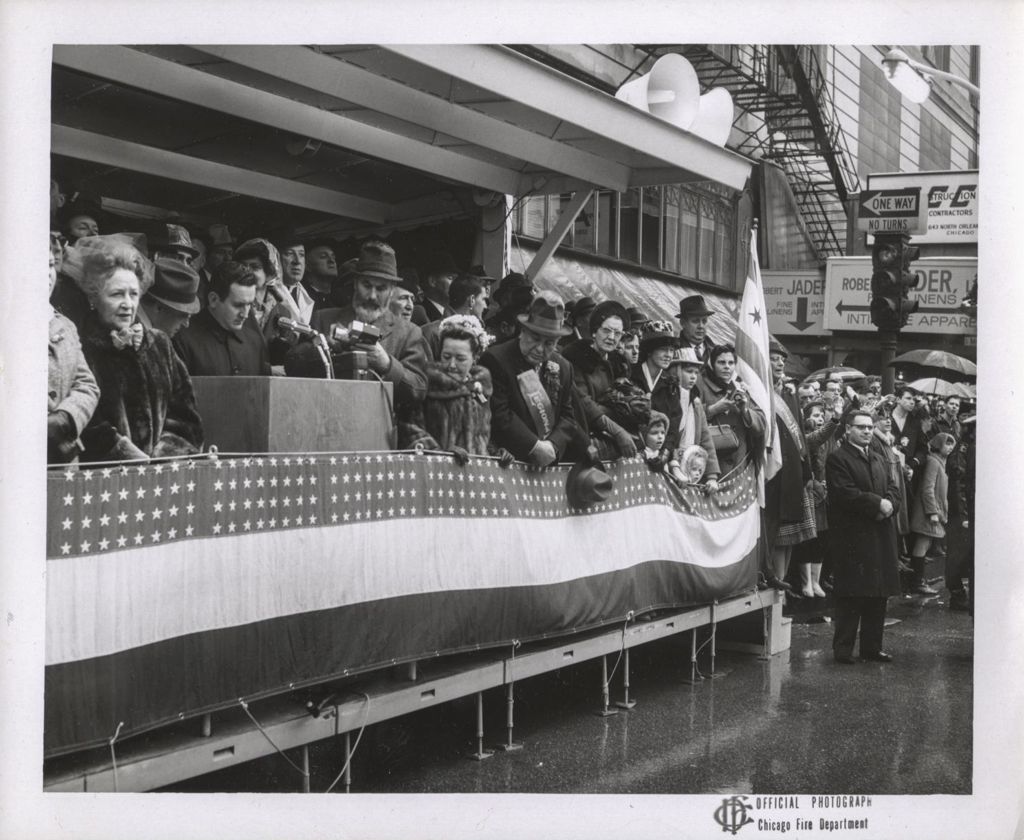 Richard J. and Eleanor Daley with others on a parade reviewing stand