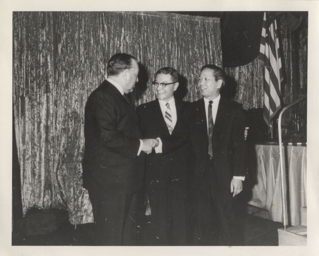 Miniature of Richard J. Daley with two men at a music event