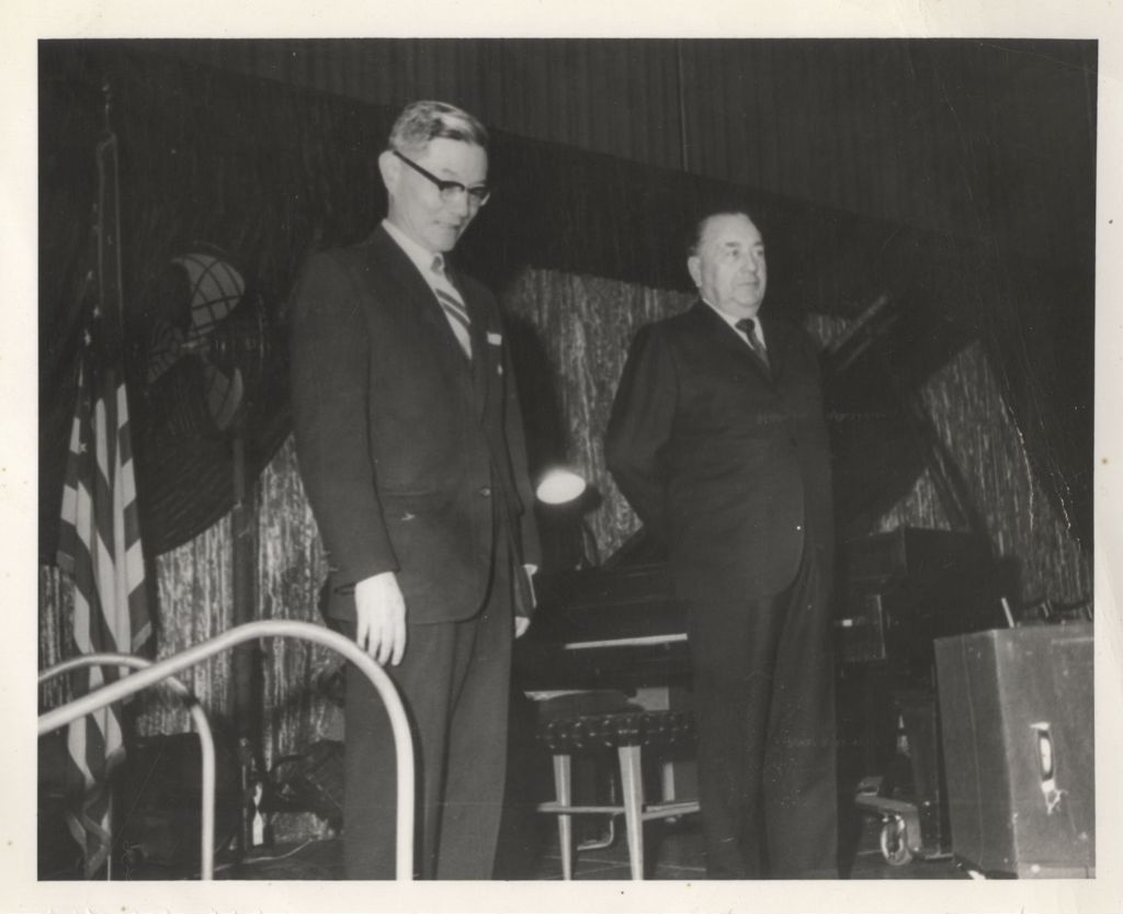 Richard J. Daley and a man at a music event