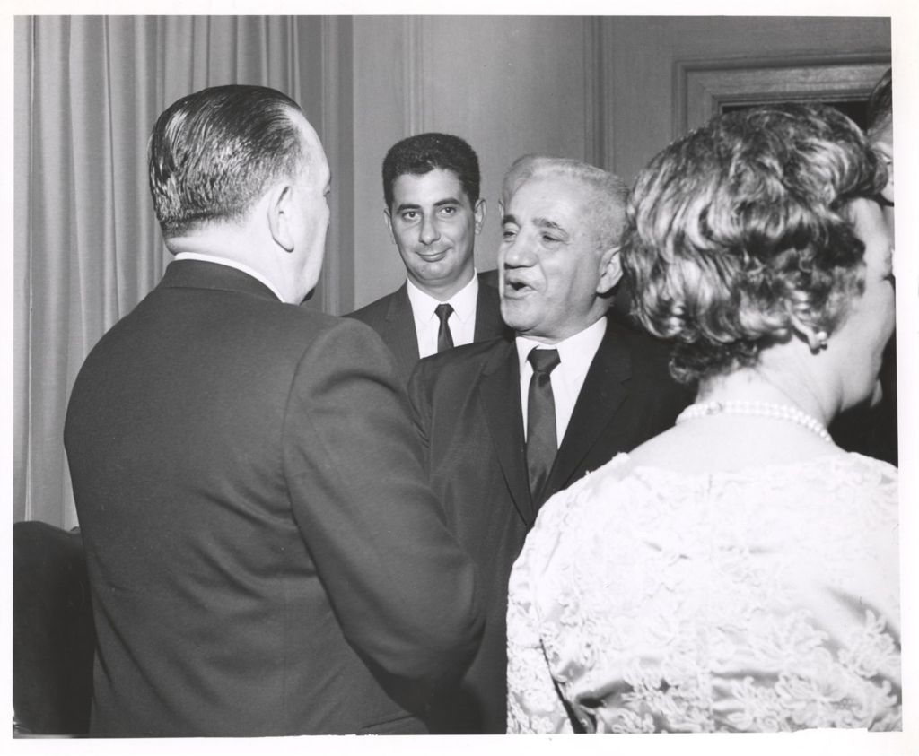 Miniature of Richard J. and Eleanor Daley greet guests at a reception