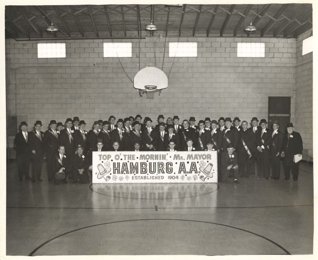 Miniature of Hamburg Athletic Association members with "Top o' the Mornin'" parade sign