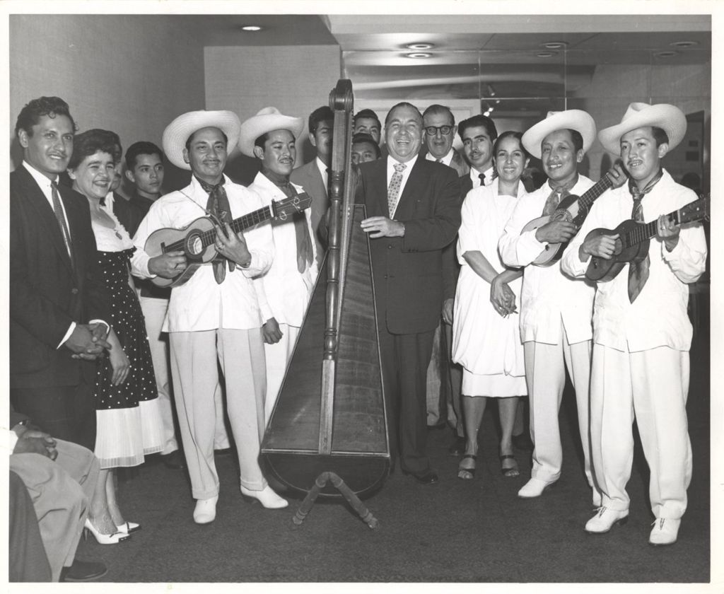 Miniature of Richard J. Daley with a group of musicians