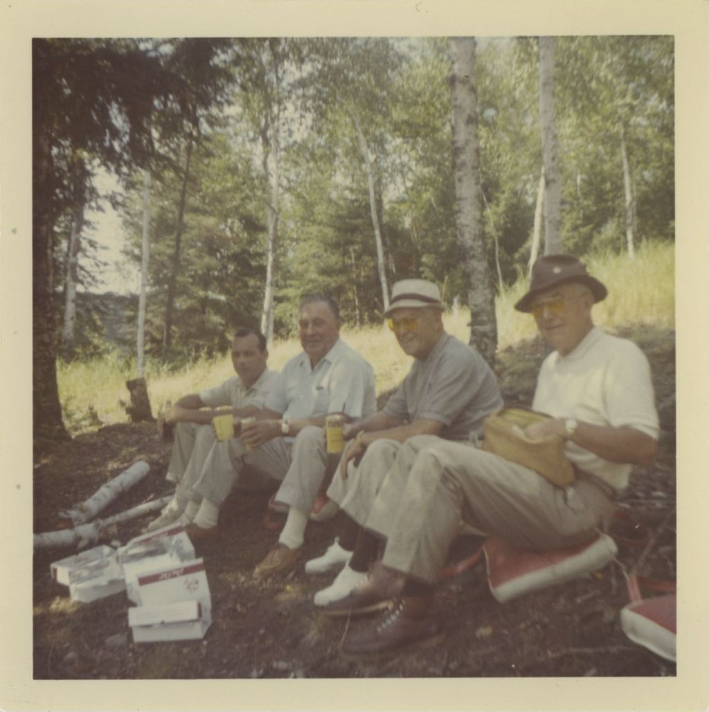Richard J. Daley having a snack with friends during a fishing trip