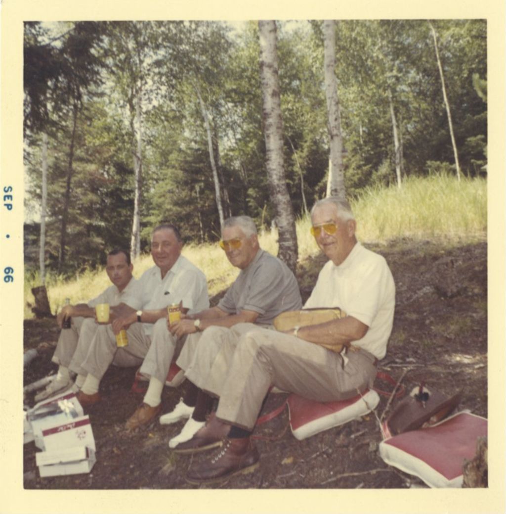 Richard J. Daley having a snack with friends during a fishing trip