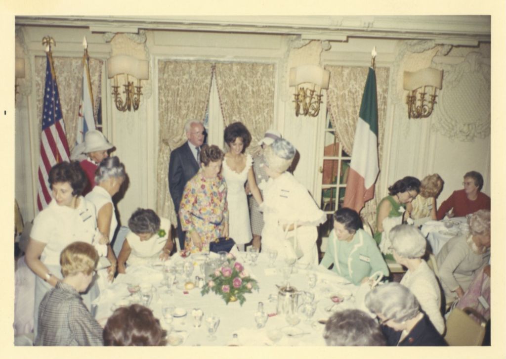Eleanor Daley with a group of women at a dining event