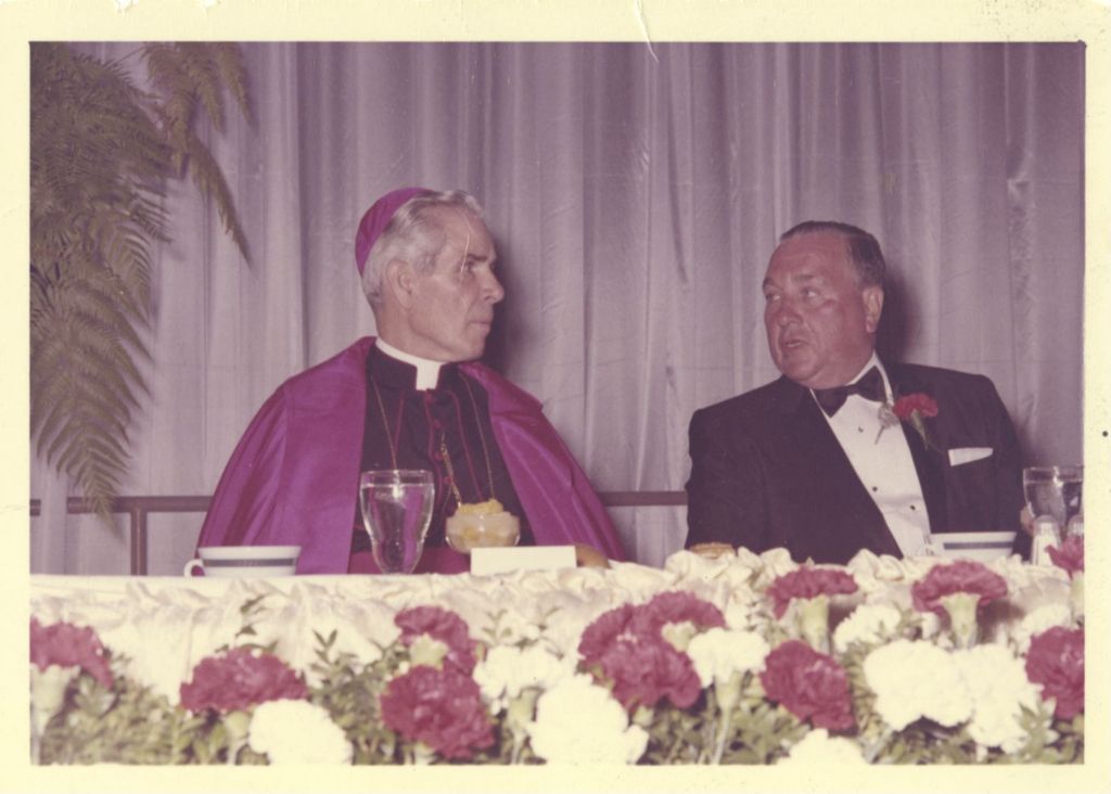 Miniature of Archbishop Fulton J. Sheen and Richard J. Daley at a banquet