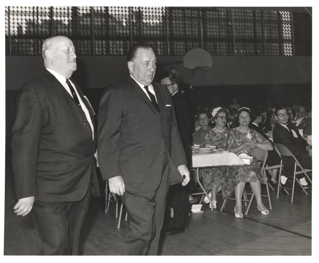 Richard J. Daley at a dining event in a gymnasium