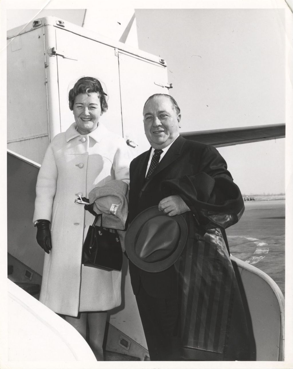 Miniature of Eleanor and Richard J. Daley board a plane for Europe