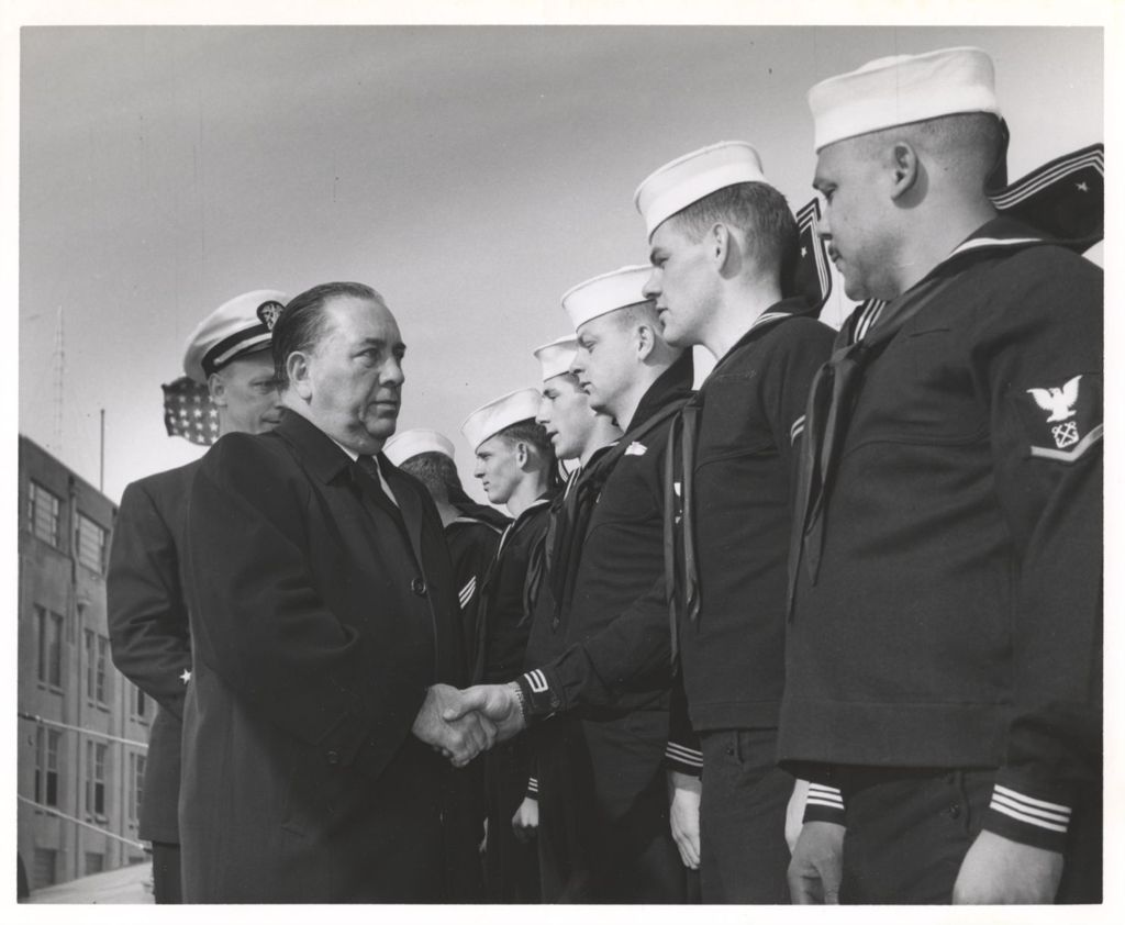 Miniature of Richard J. Daley shaking hands with sailors