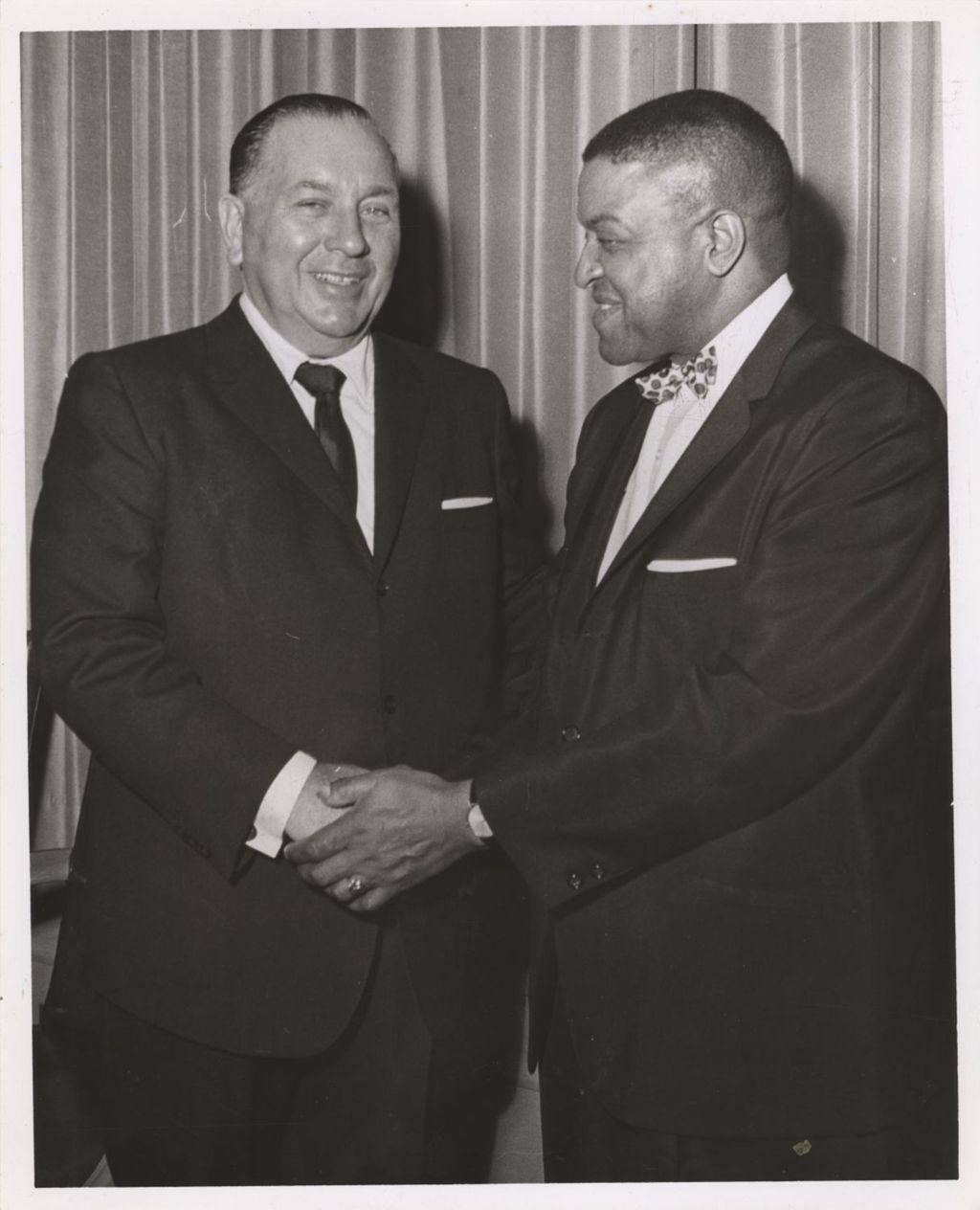 Richard J. Daley with an African American man