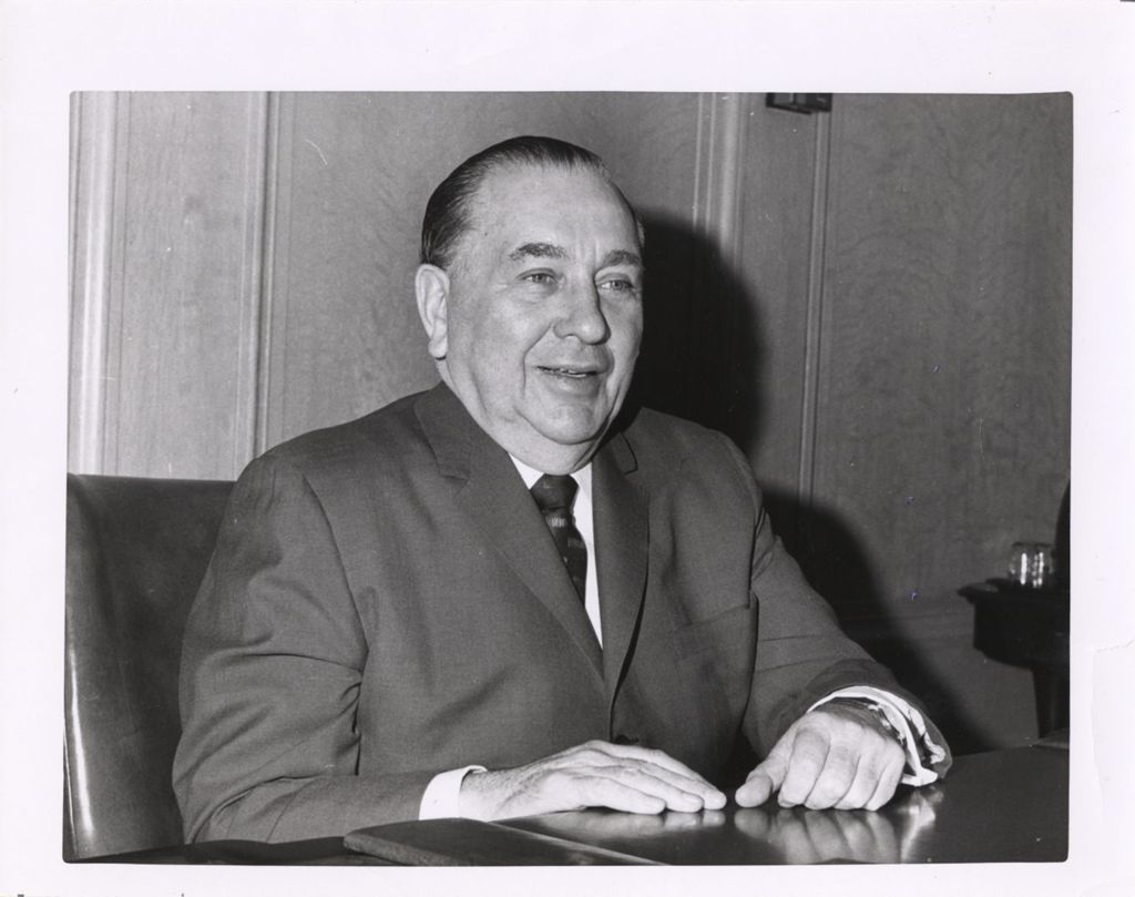 Miniature of Richard J. Daley seated at a desk